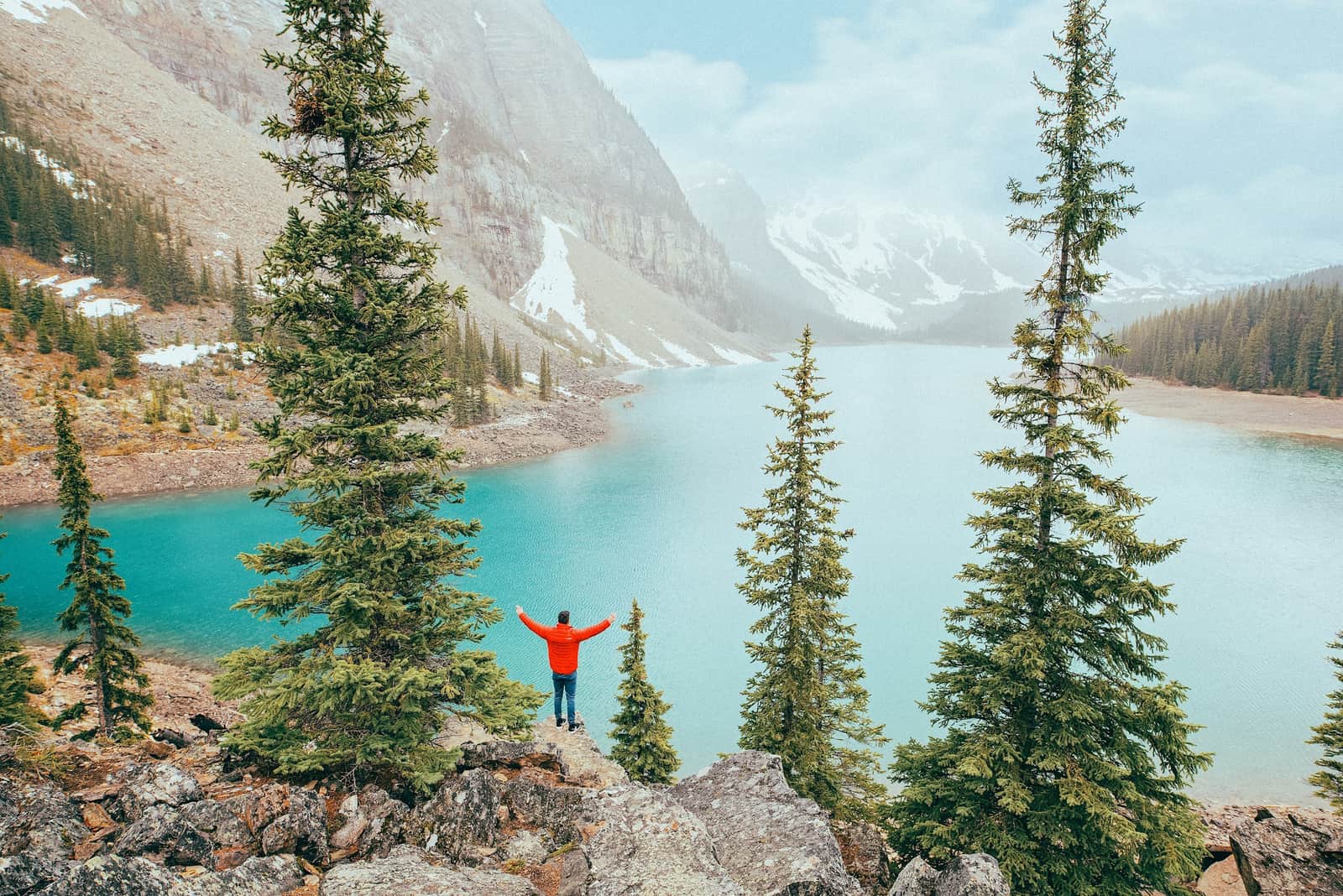Traveler Posing at Edge of Lake, Banff, Canada