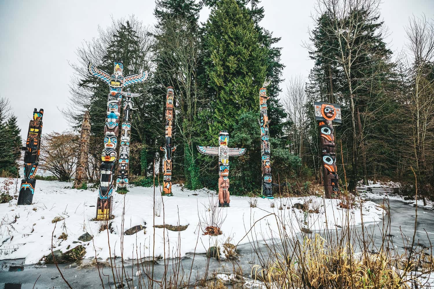 Totem Poles Standing in the Snow, Banff, Canada
