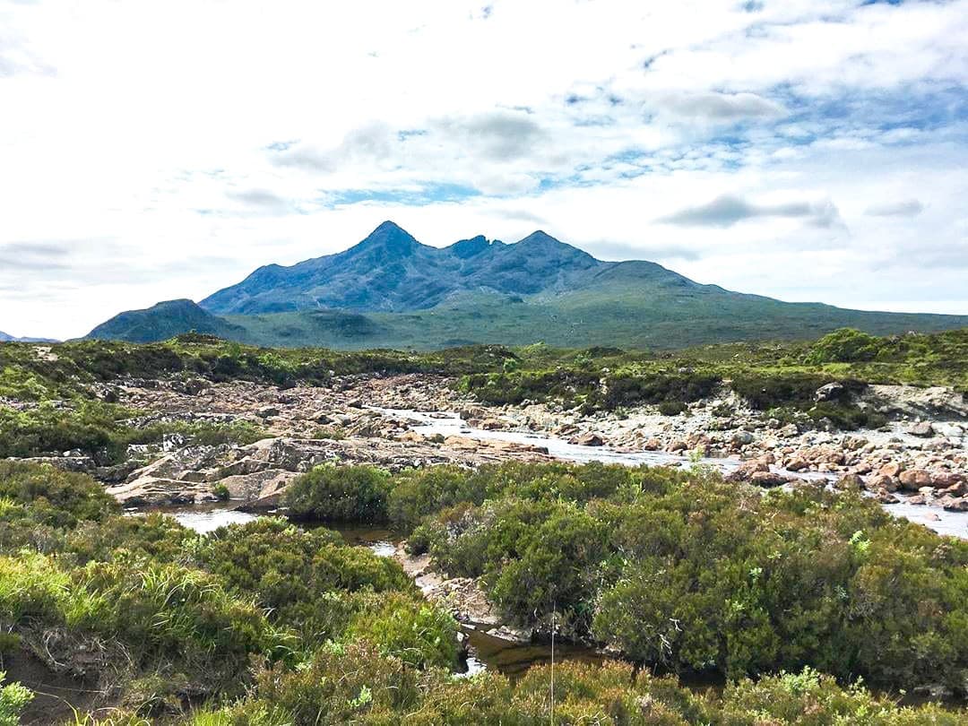 A view of a river and mountains in the West Highlands of Scotland