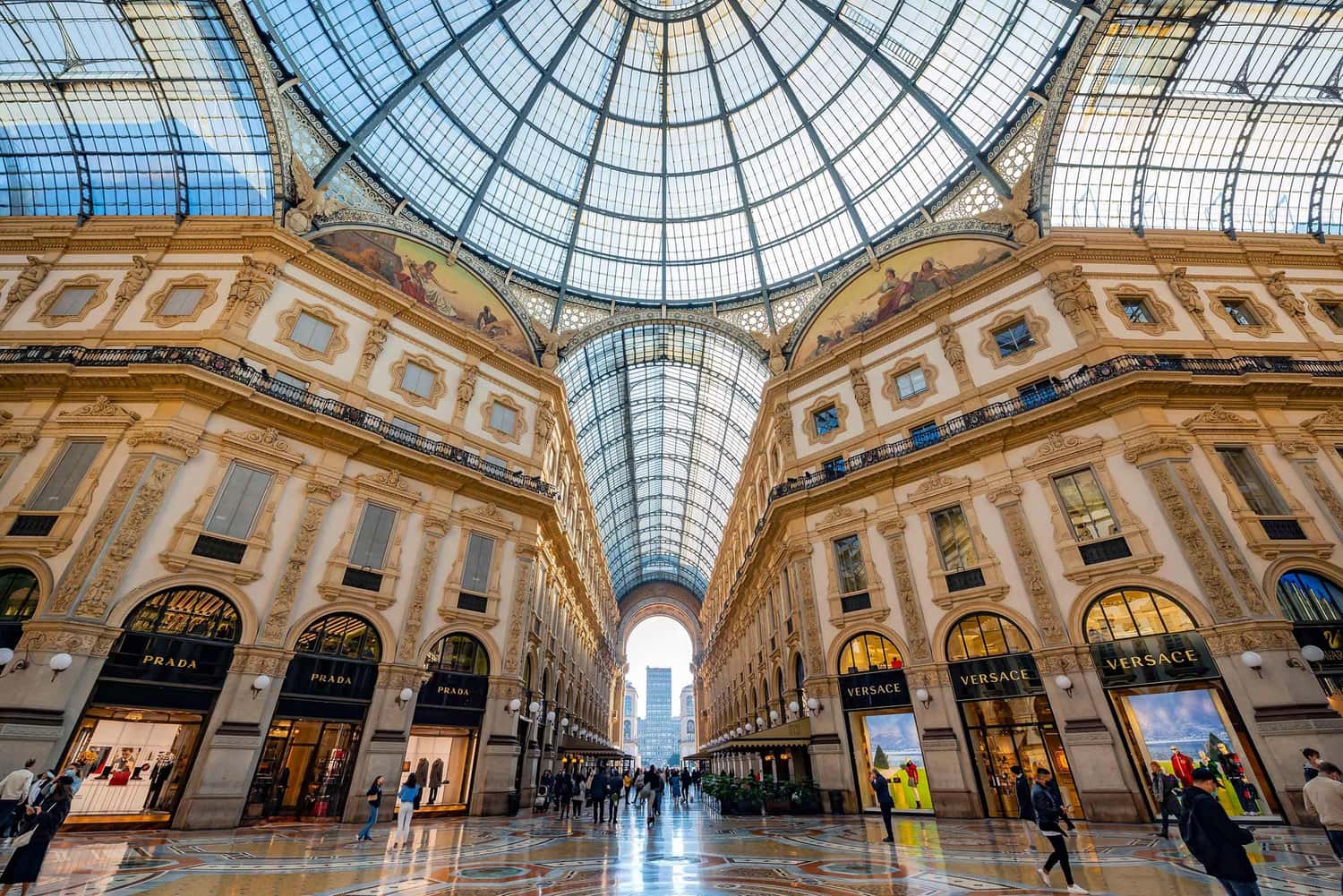 Interior view of Galleria Vittorio Emanuele II with glass dome in Milan
