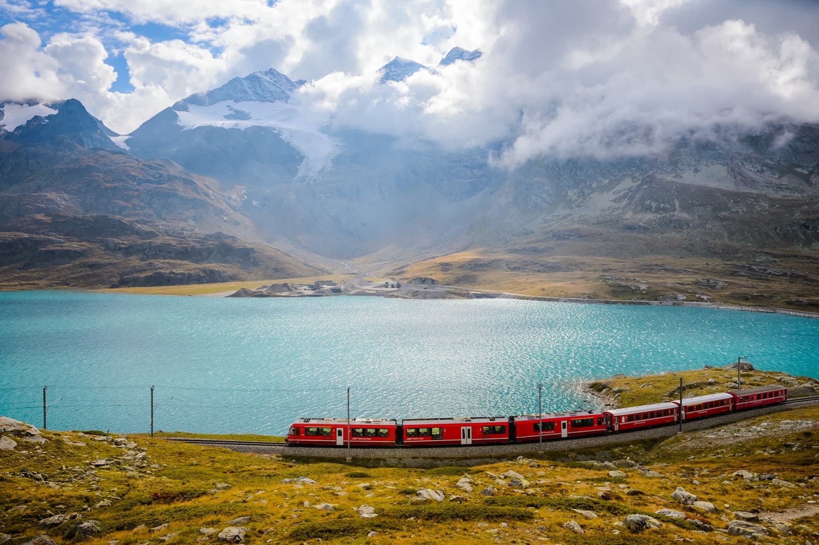 Overhead view of a train passing on the Bernina railway in Switzerland