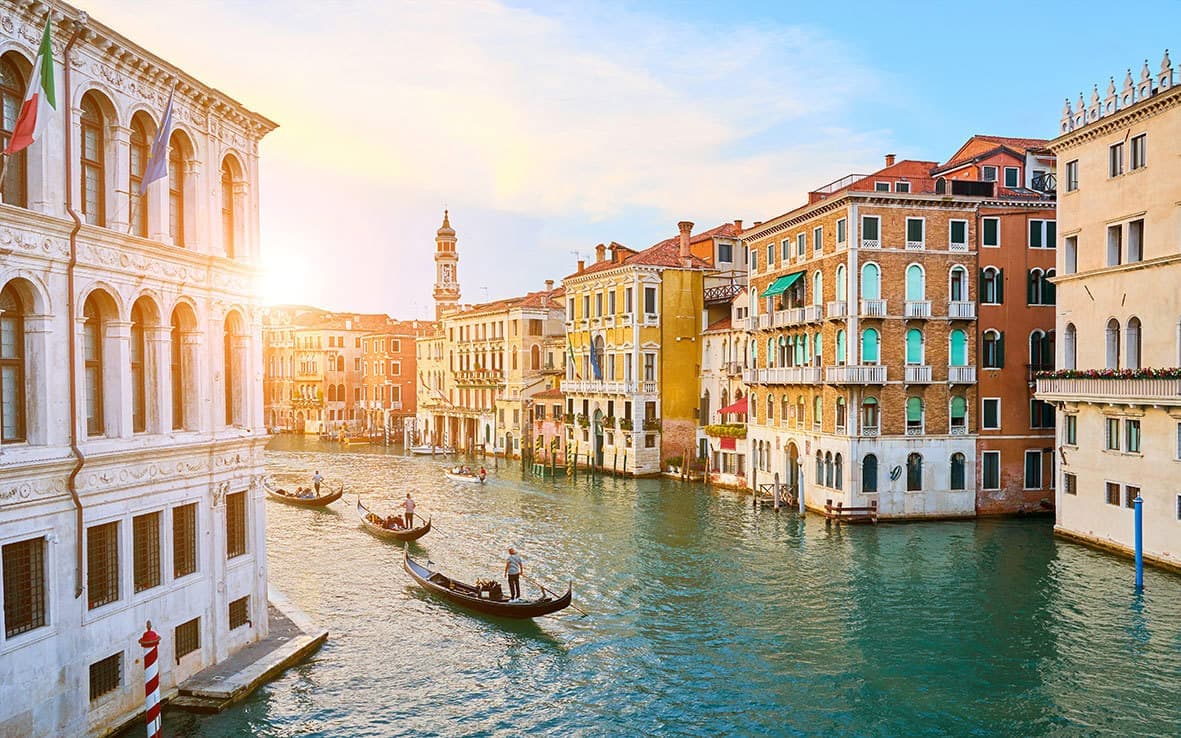 Gondaliers at Sunset in Venice, Italy