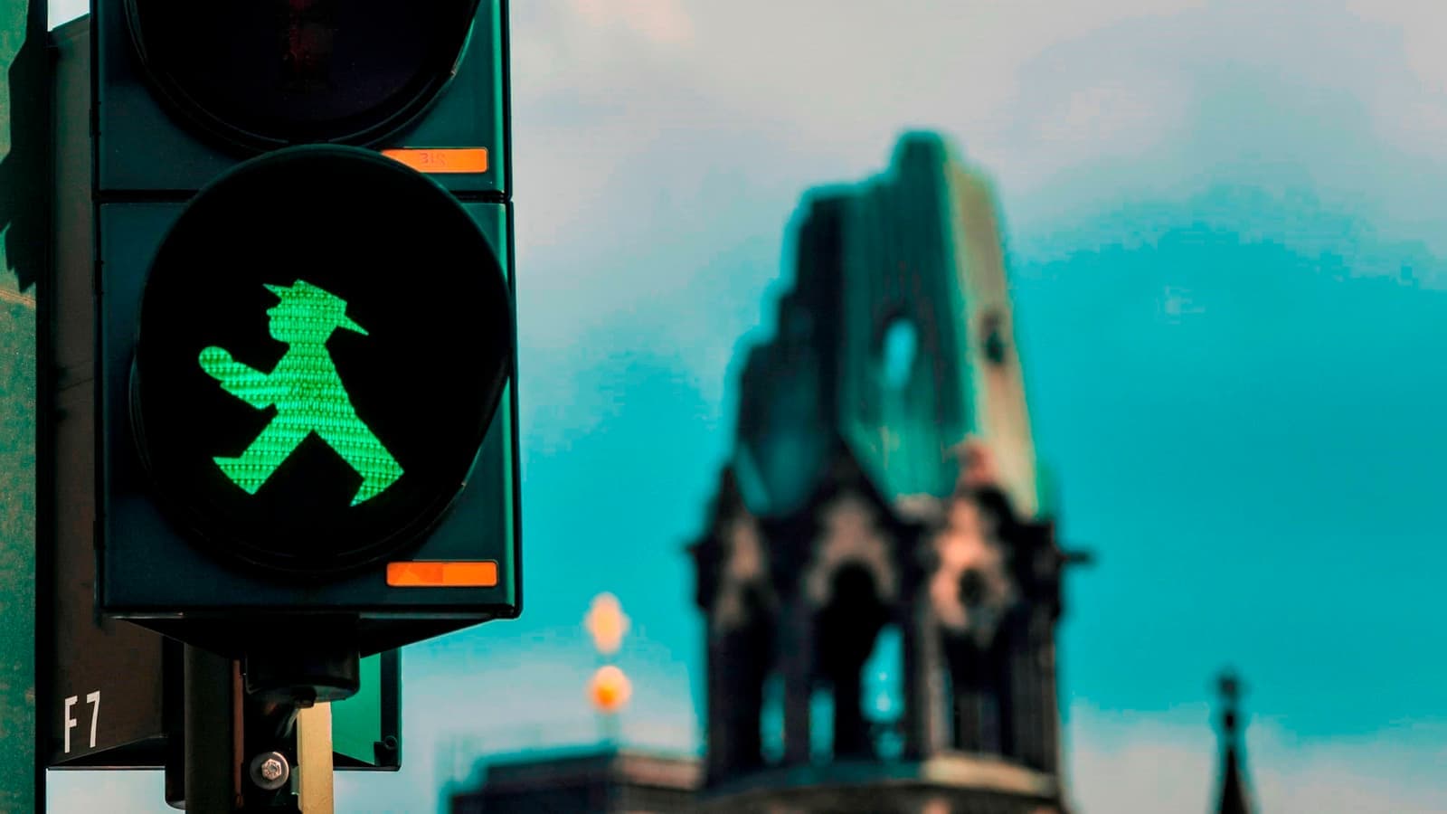A close-up of a green Ampelmann traffic light in Berlin, Germany