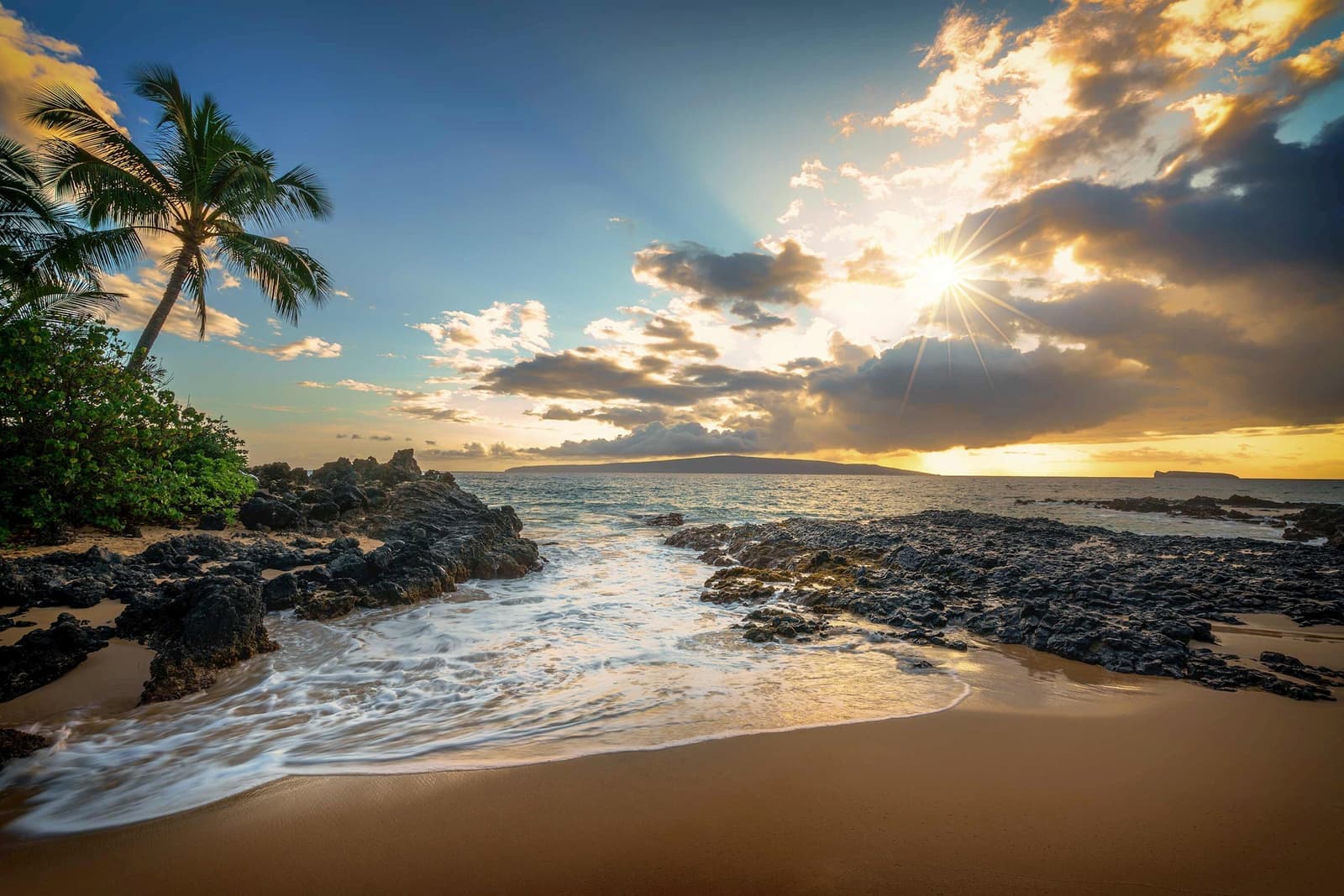 The sun setting over Makena Beach in Maui, Hawaii