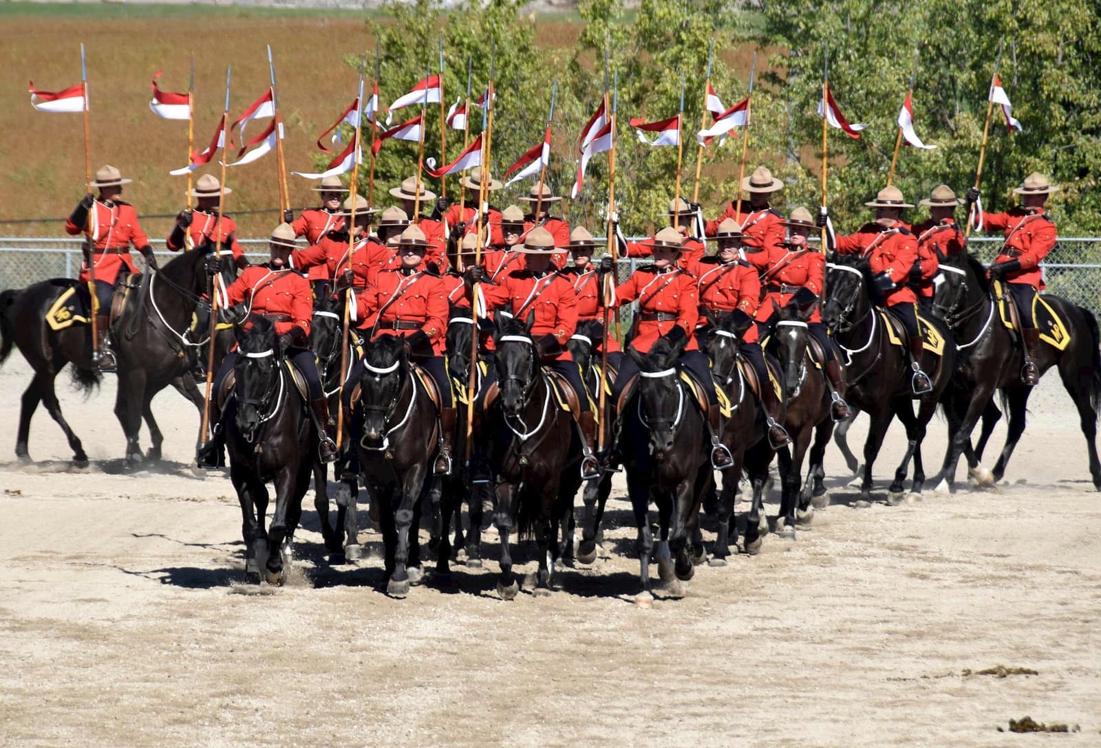 Mounties riding horses in Banff, Alberta, Canada