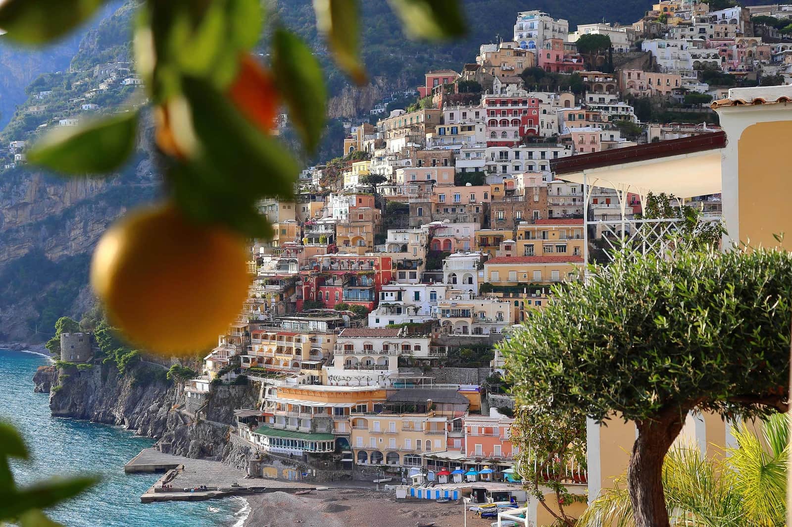 Colourful cliffside houses of Positano on the Amalfi Coast with lemon tree