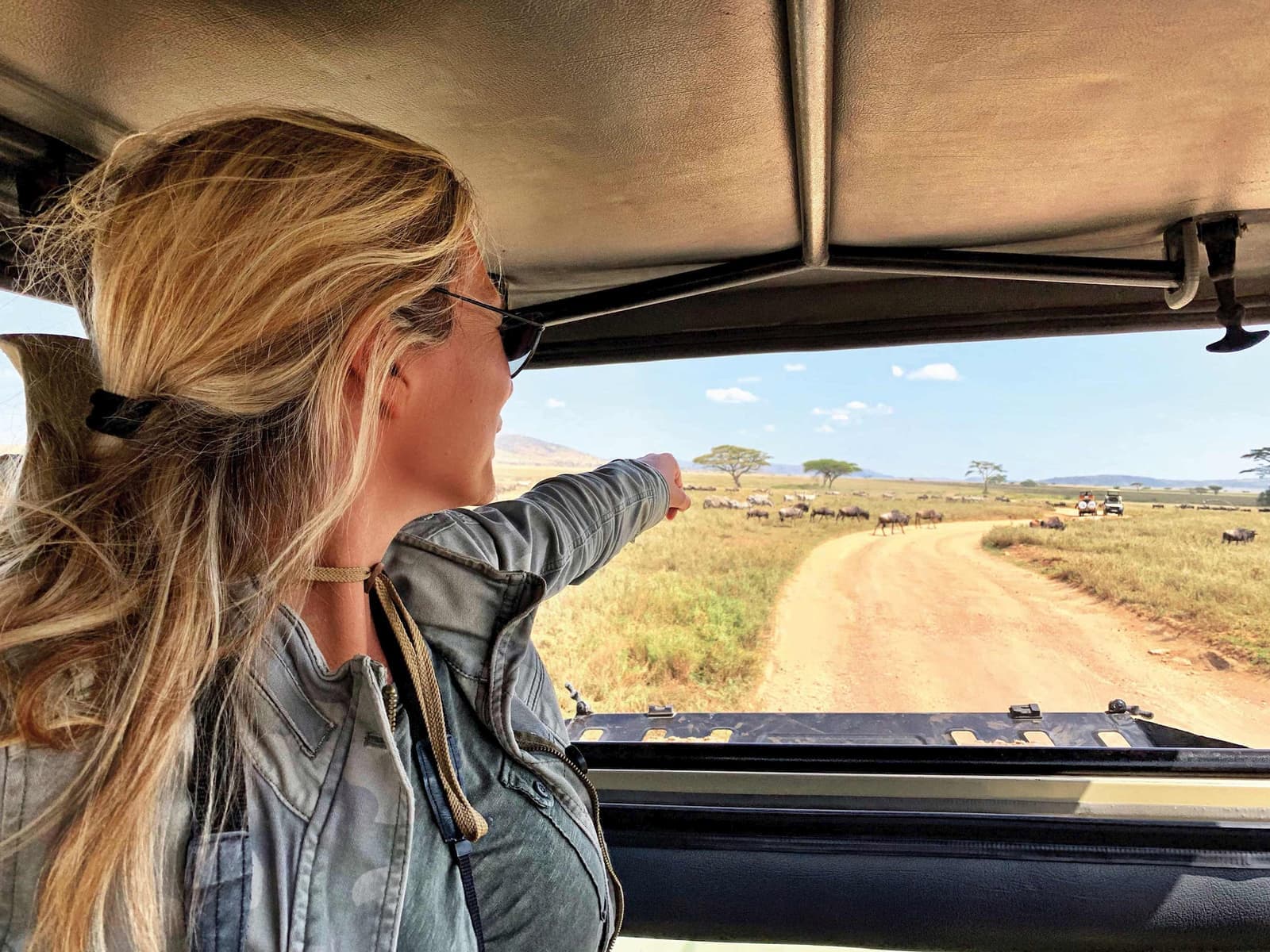 A person on a safari in Serengeti in Tanzania