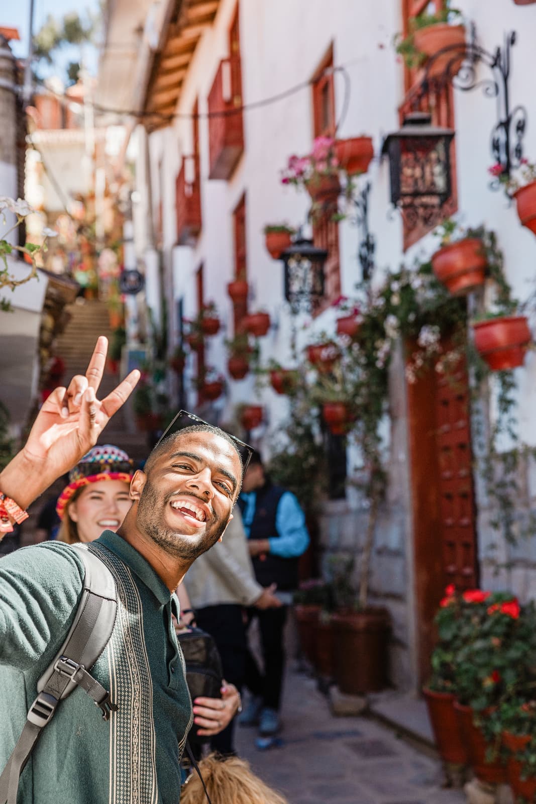 Travellers posing for a picture in Cusco, Peru