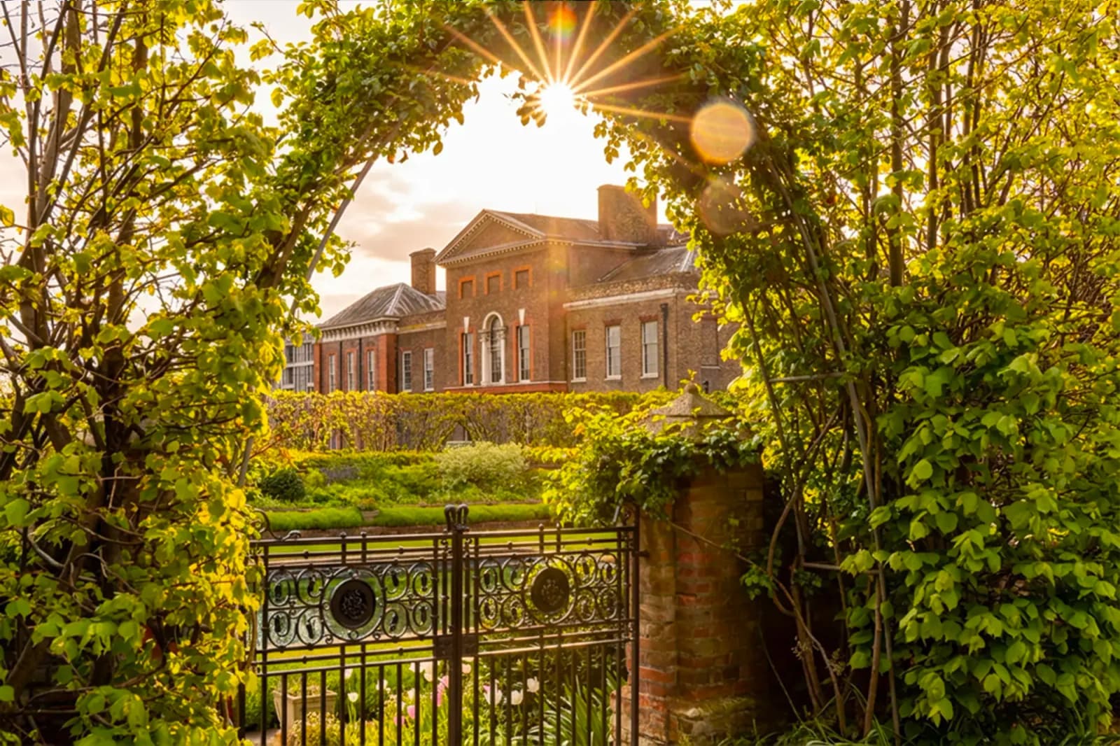 A Sunlit Gate Leading to the Gardens at Kensington Palace, London