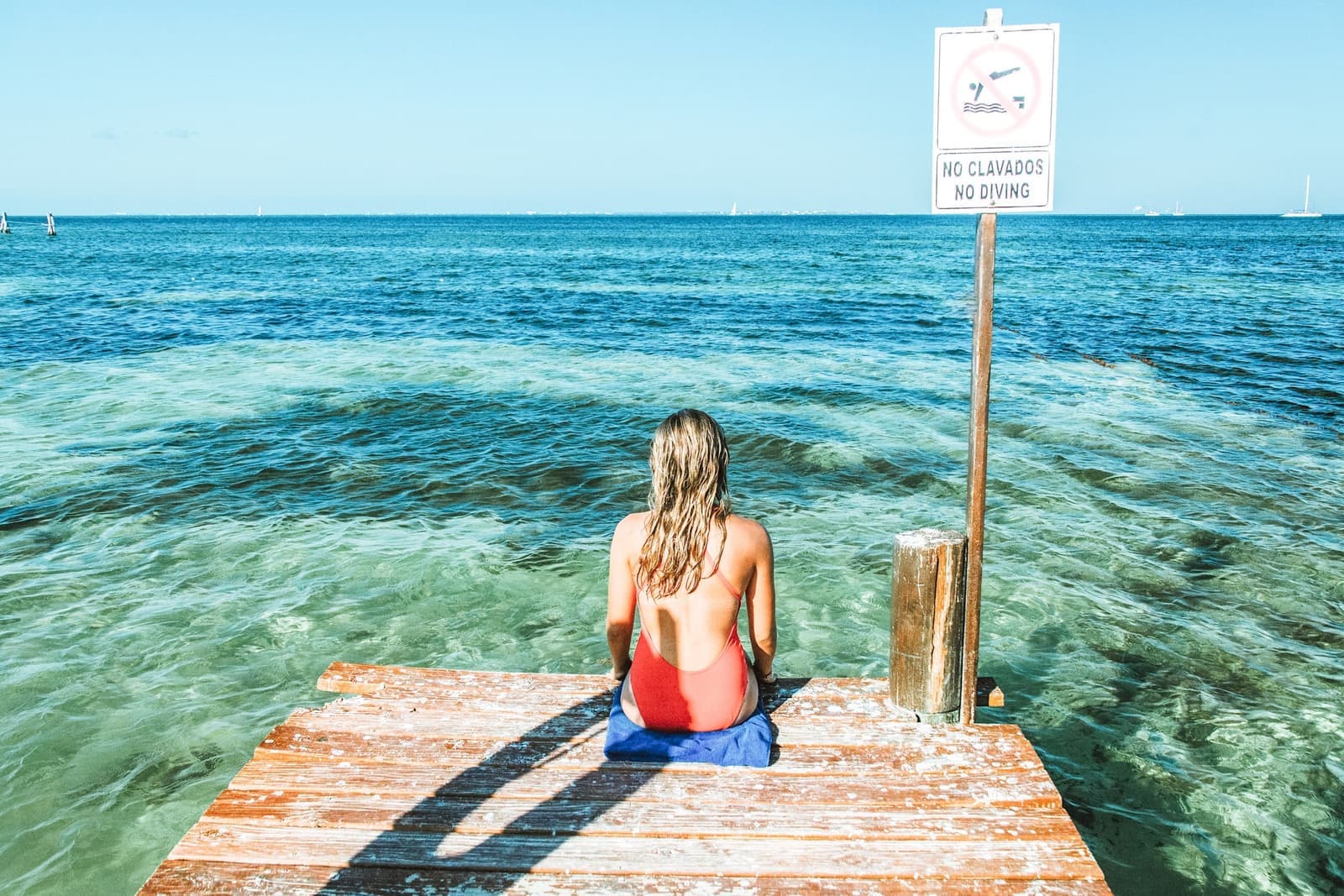 Traveller on a jetty in Cancun, Mexico