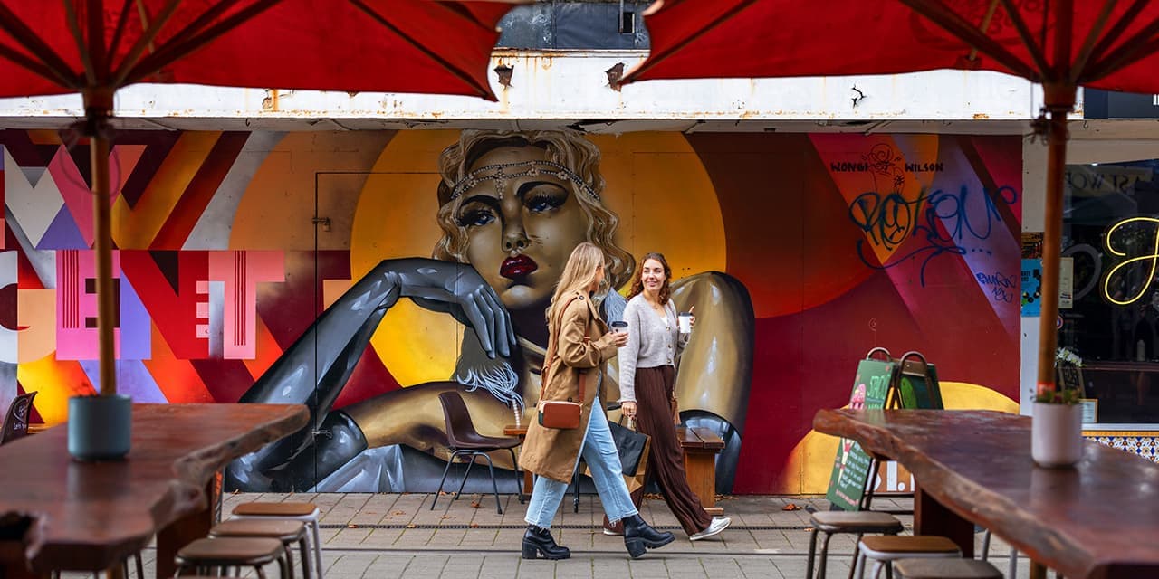 Ladies Walking Christchurch with Mural in Background