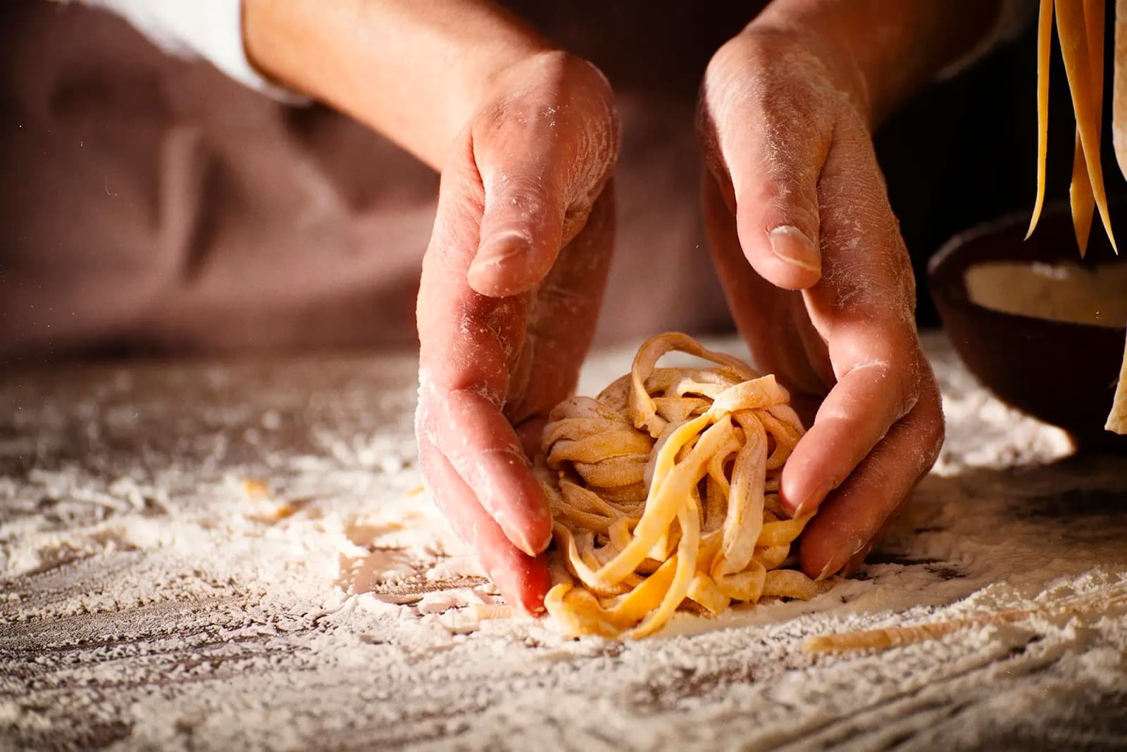 A close up of handmade pasta being made.
