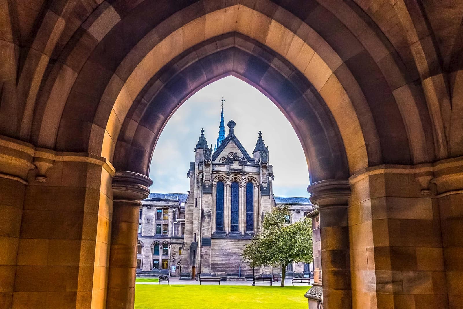 A look through an arch into the University of Glasgow