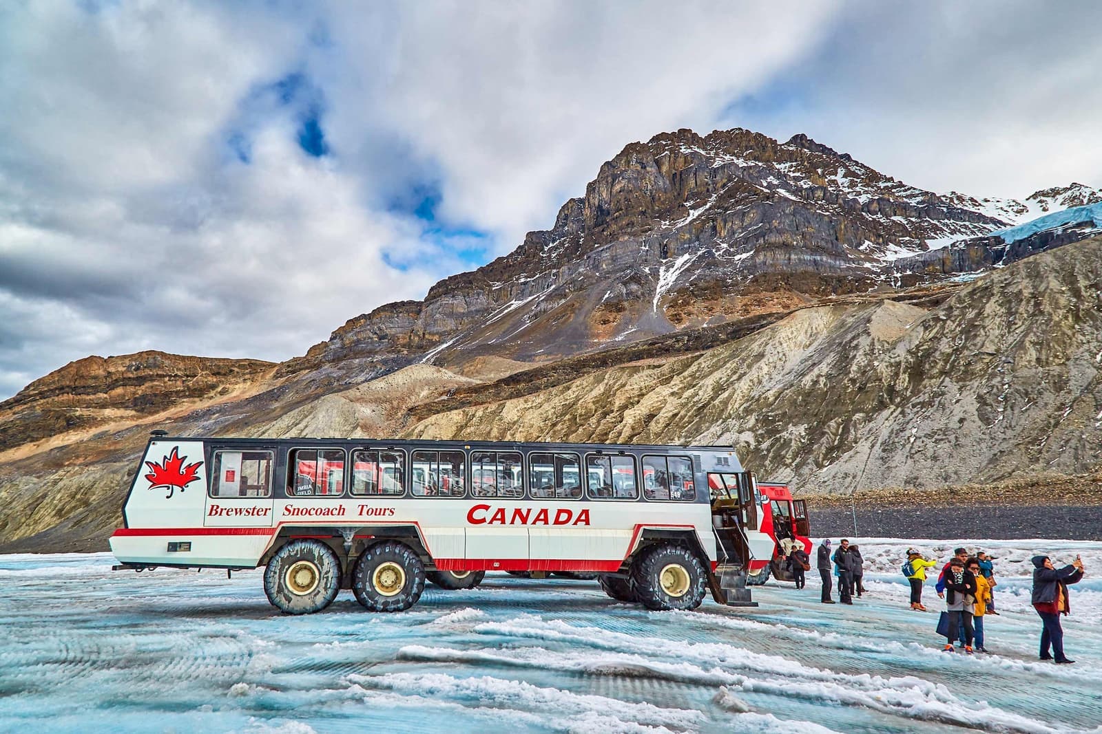 People on the Glacier Walk in Athabasca Glacier, Alberta, Canada