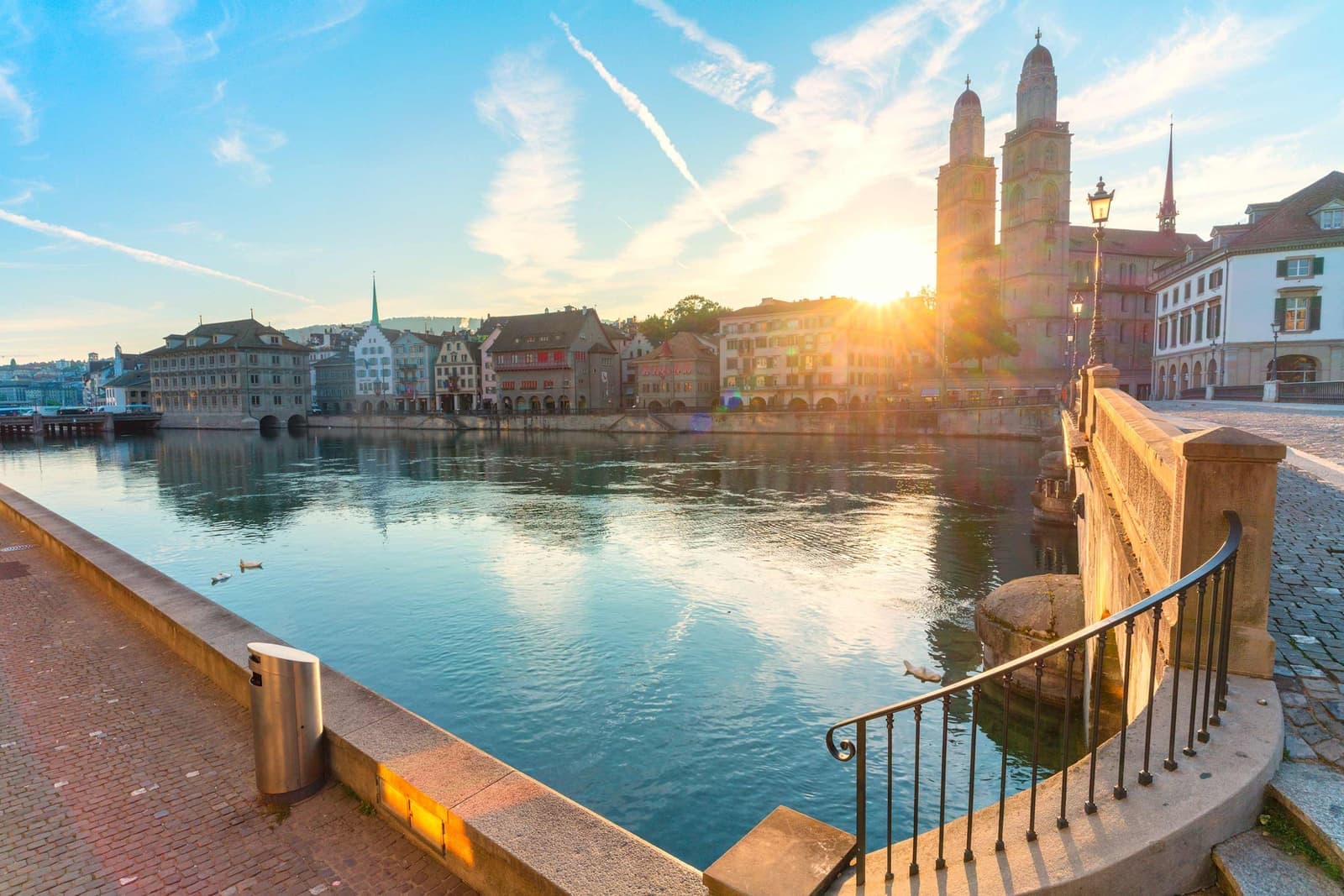 The sun peaking through the city of Zurich, Switzerland