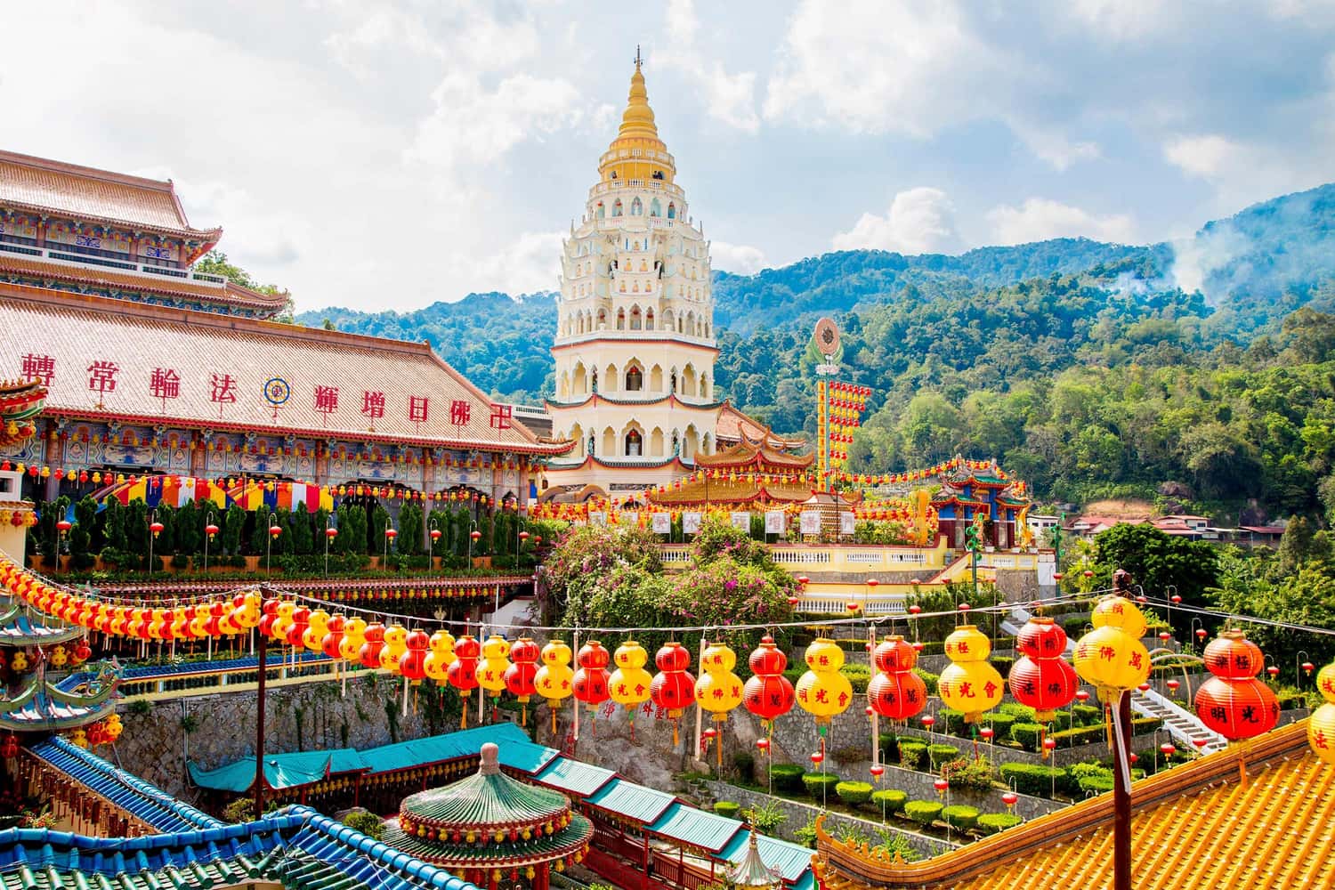 Panoramic view of Kek Lok Si Temple with red and yellow lanterns in Penang, Malaysia