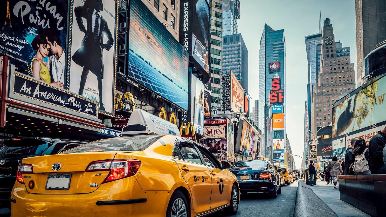 Scenic view of an iconic yellow taxi in New York City, USA