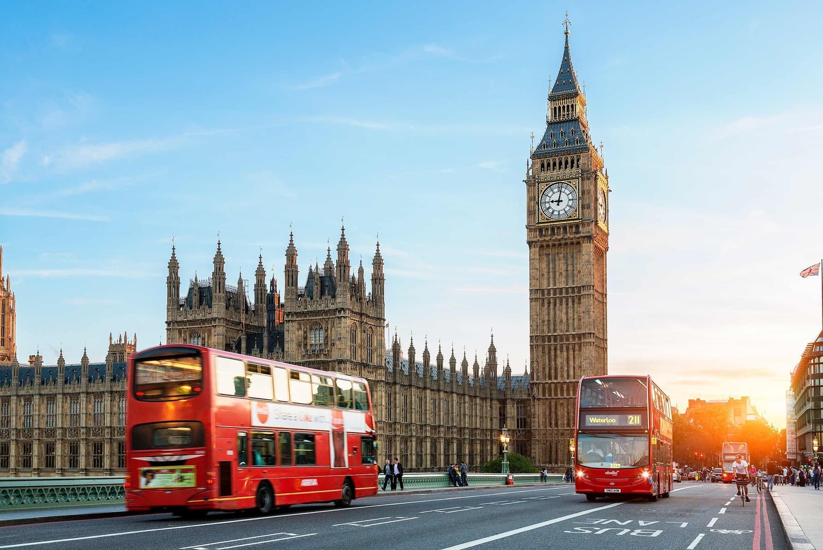 A street view of the Big Ben and a double decker bus in London, England